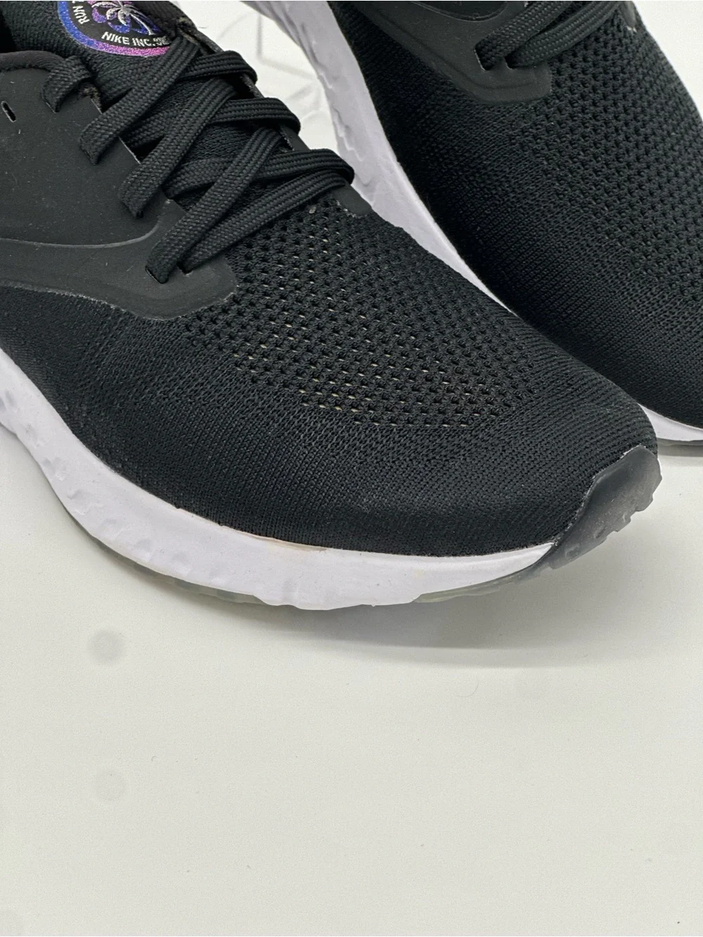 Nike Black Knit Running Sneakers with Pink Heel Accent